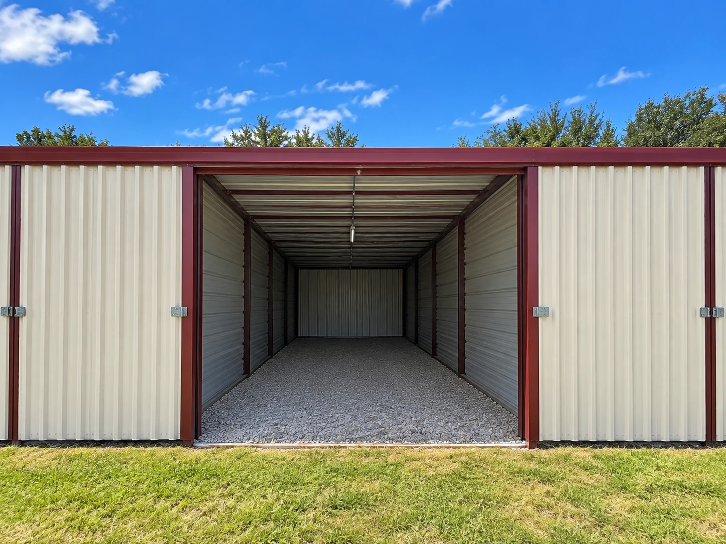 Open enclosed storage unit with gravel floor at Bob's Lake Country Motel
